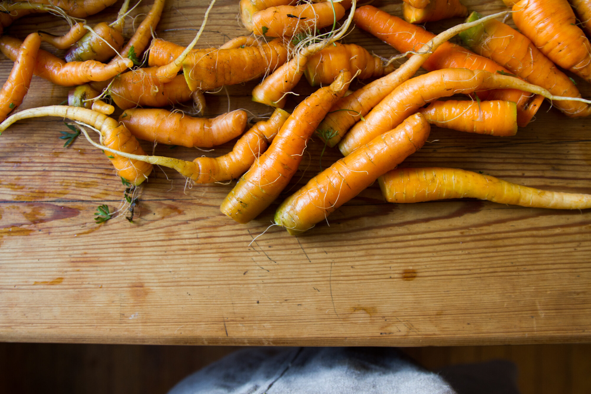 waste not: carrot ginger soup with carrot top-herb pesto.